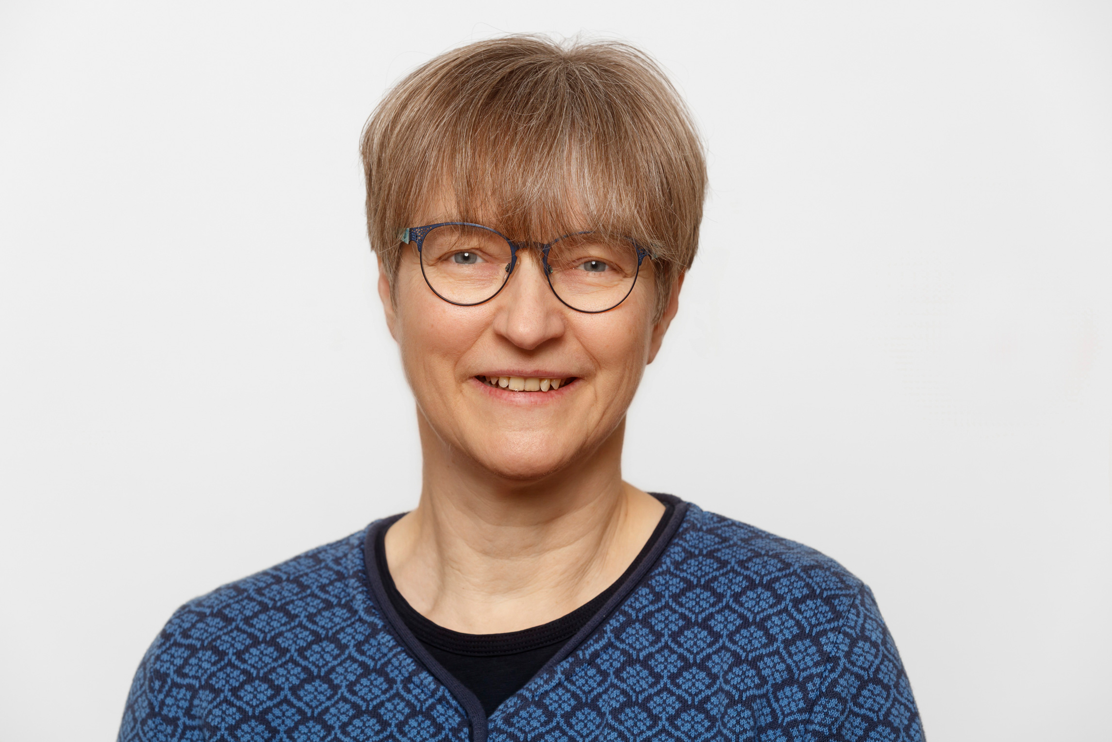 Dr. Michalek lächelt in die Kamera.